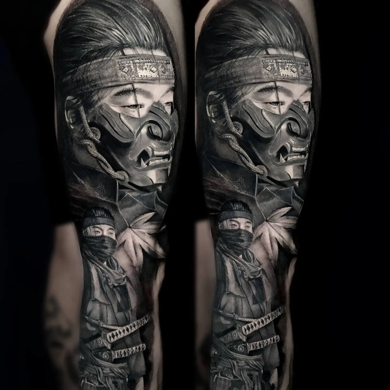 Black-and-Grey-Tattoo von Ruby mit maskiertem Porträt und bewaffneter Figur in zwei Ansichten